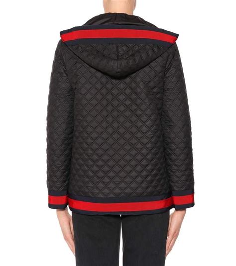 gucci tweed trouser|Gucci black diamond quilted coat.